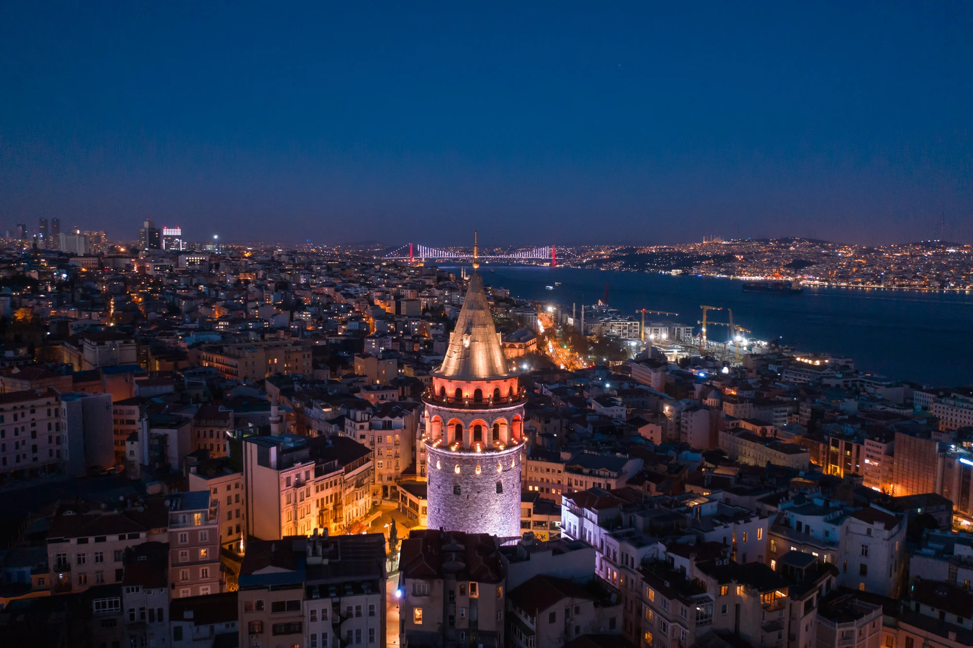 Aerial,galata,tower,and,istanbul,bosphorus,in,evening,blue,hour