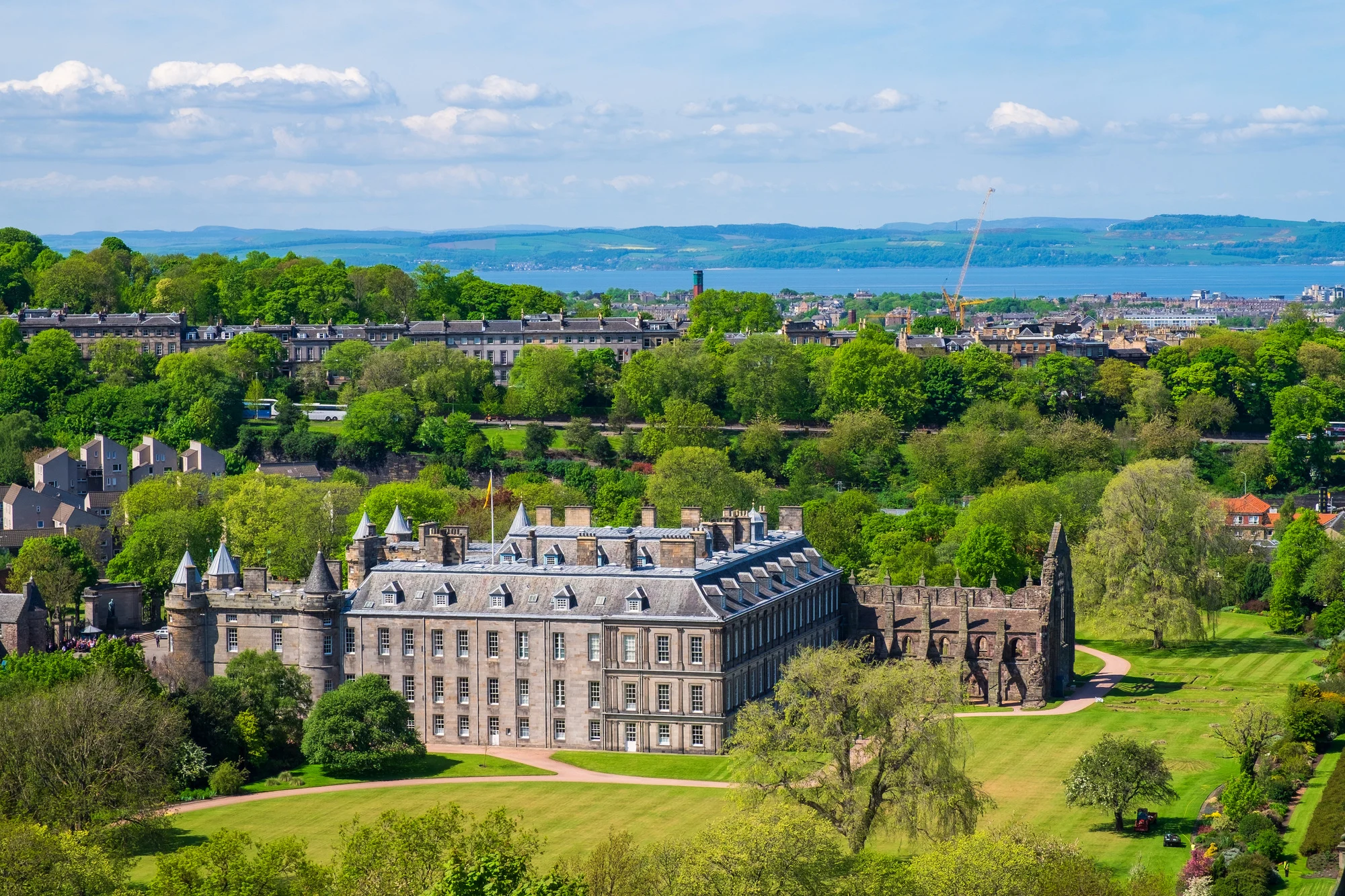 View,to,edinburgh/scotland,with,the,holyrood,palace,in,the,foreground