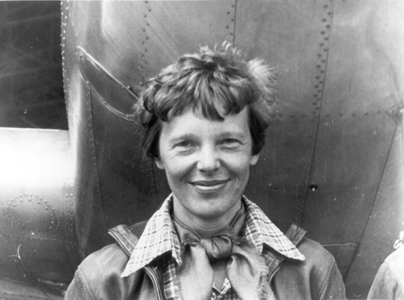 Amelia Earhart Standing Under