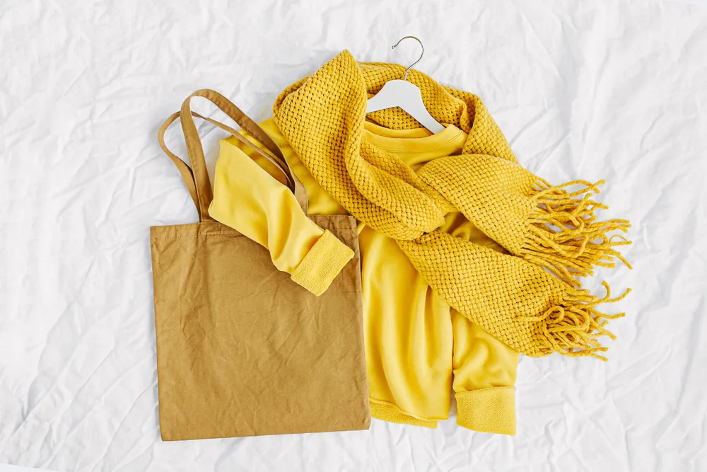 Yellow,sweater,with,knitted,scarf,and,tote,bag.,autumn,fashion