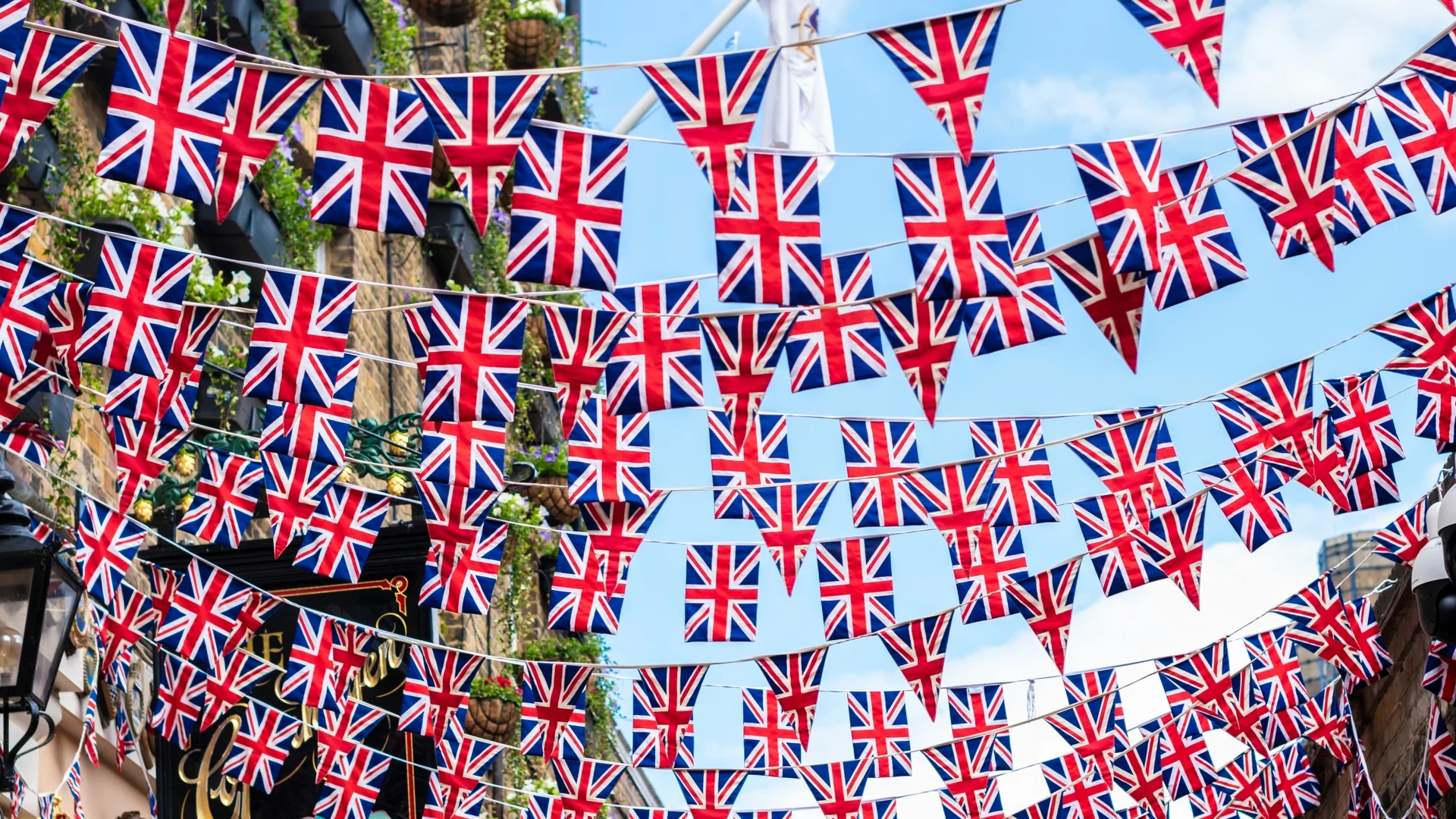 Union,jack,flags,hanging,at,the,street,ready,to,national
